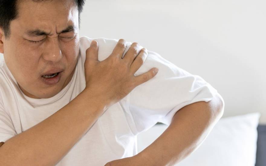 The symptoms of frozen shoulder typically progress through three stages.